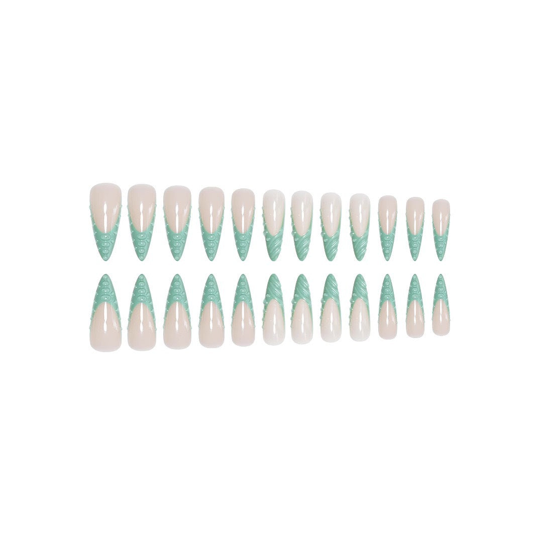 Artistic Stiletto Press-On Nail Design with 3D Shell Accents Bowlift