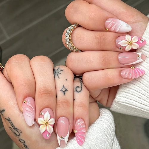 Nail art set with filigree flower patterns and sparkling accents Bowlift