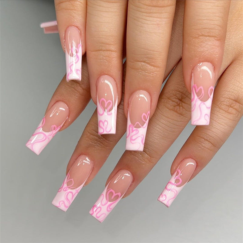 Artistic Long Press-On Nails with Heart Design Bowlift