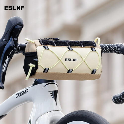 compact cylindrical handlebar bag with elastic bungee and universal Velcro mount Bowlift