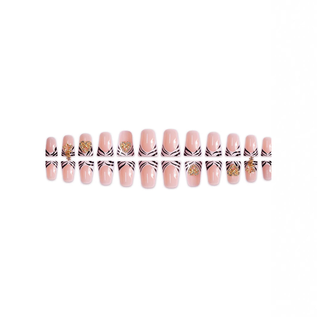 Artistic Zebra-Patterned Nail Enhancements with Gem Accents Bowlift