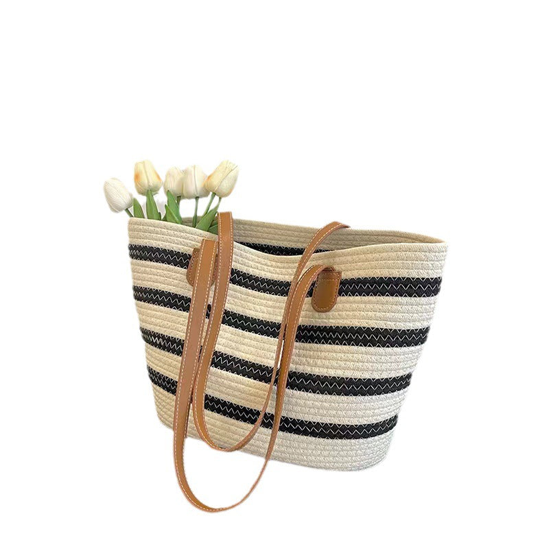 Elegant Tote Bag Made of Woven Bast Material with Robust Leather Accents Bowlift