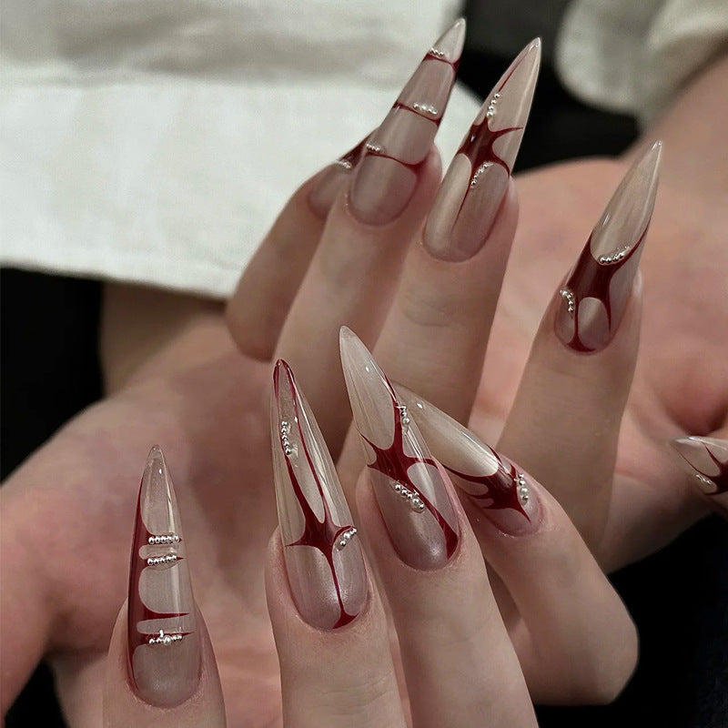 Artistic Stiletto Press-On Nails with Unique Abstract Design Bowlift