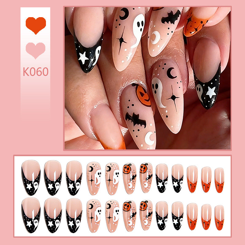 Halloween-themed artificial nails with ghost and pumpkin motifs Bowlift
