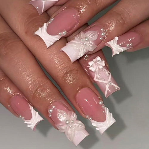Nail set with elegant flower and glitter decorations Bowlift