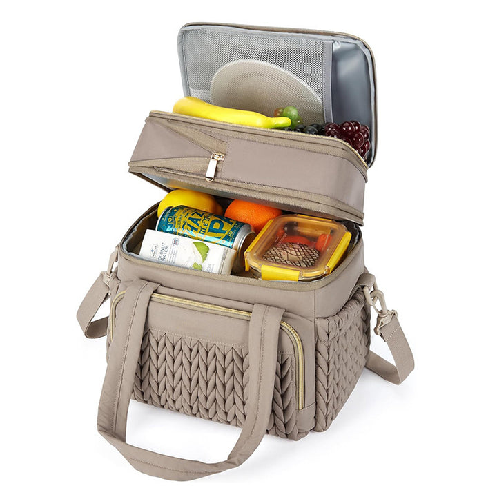 Insulated picnic bag with multi-layered interior compartment and practical carrying system Bowlift