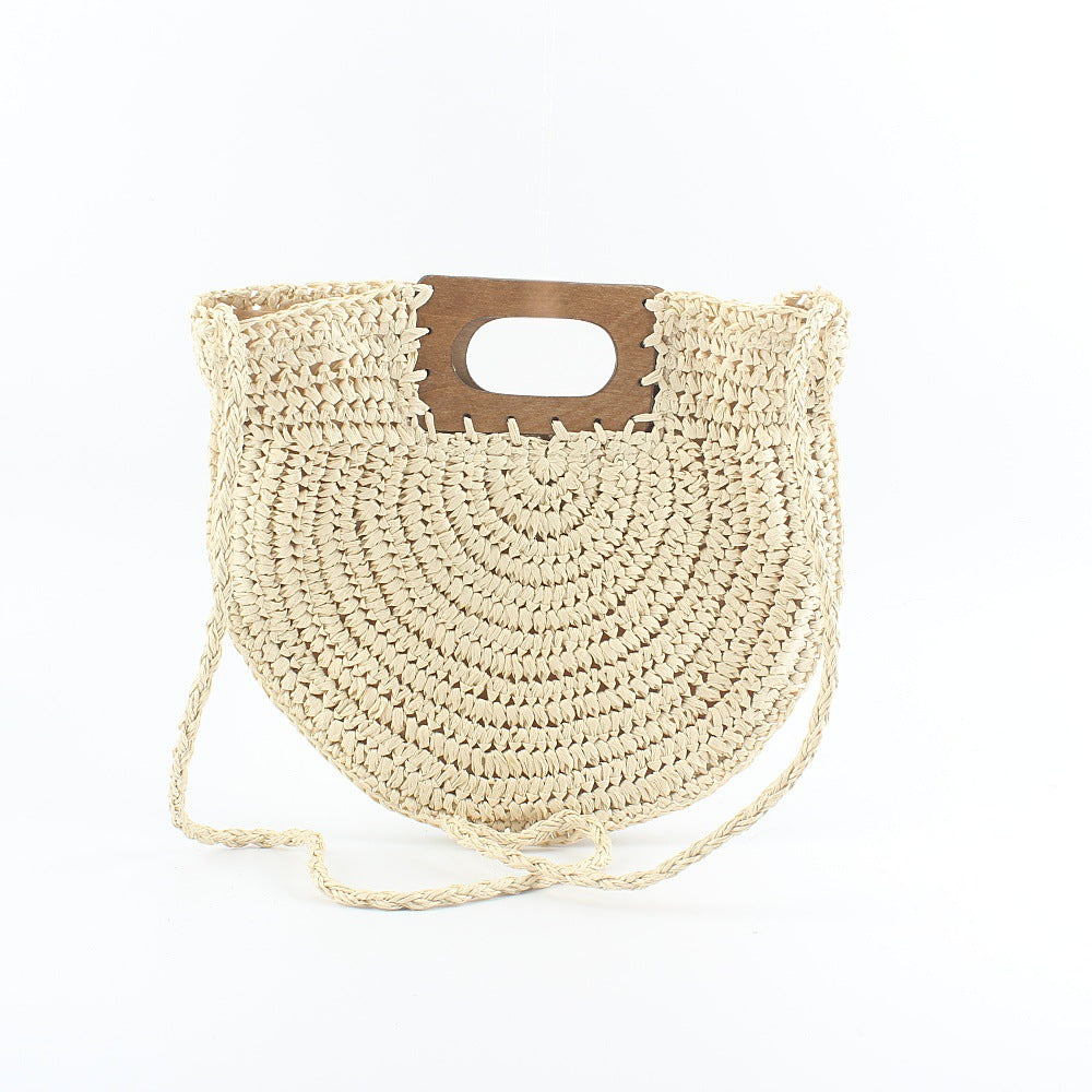 Handbag made of hand-woven natural material with stylish wooden handle Bowlift