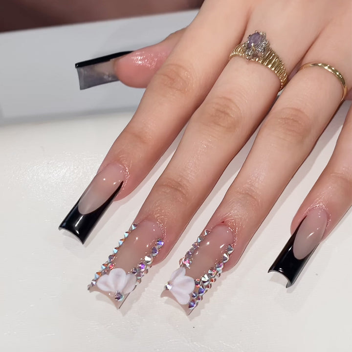 Elegant Stiletto Press-On Nail Art with Rhinestone Accents Bowlift