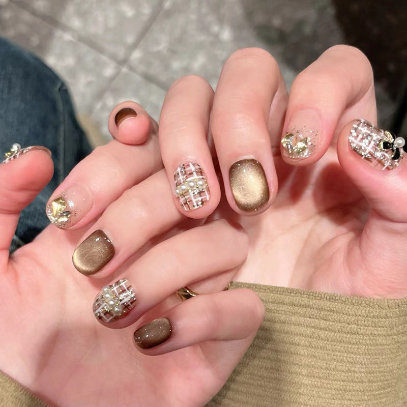 Glamorous Press-On Nail Set with Decorative Gemstone Accents Bowlift