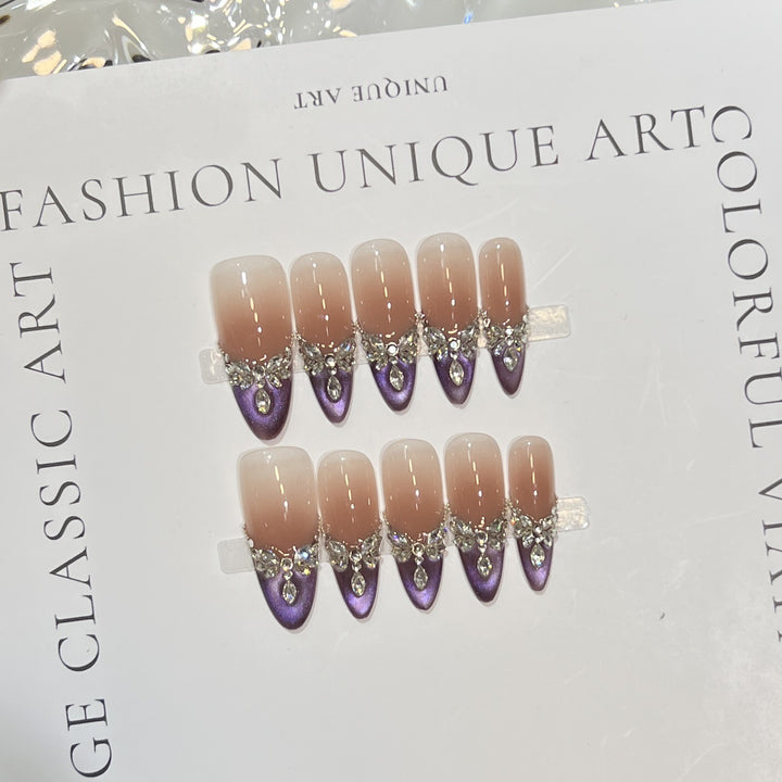 Elegant Stiletto Press-On Nail Set with Gemstone Embellishments Bowlift