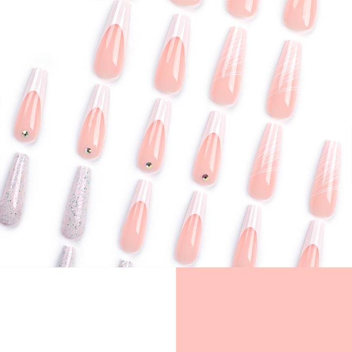 Artificial nail extensions with elegant glitter design Bowlift