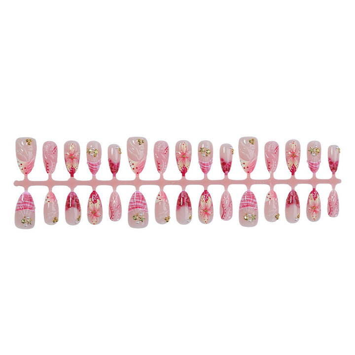 Creative nail art set with romantic flower pattern and sparkling accents Bowlift
