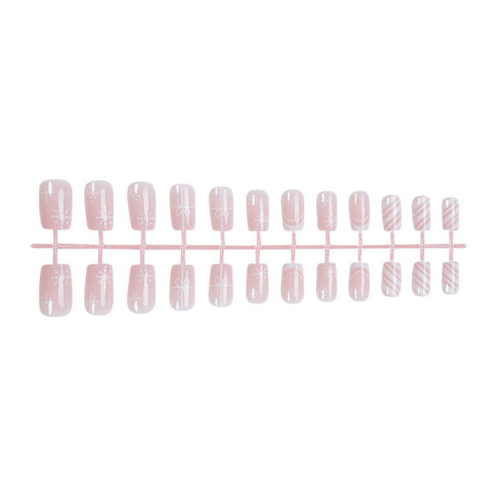 Nail set with elegant floral and striped designs Bowlift