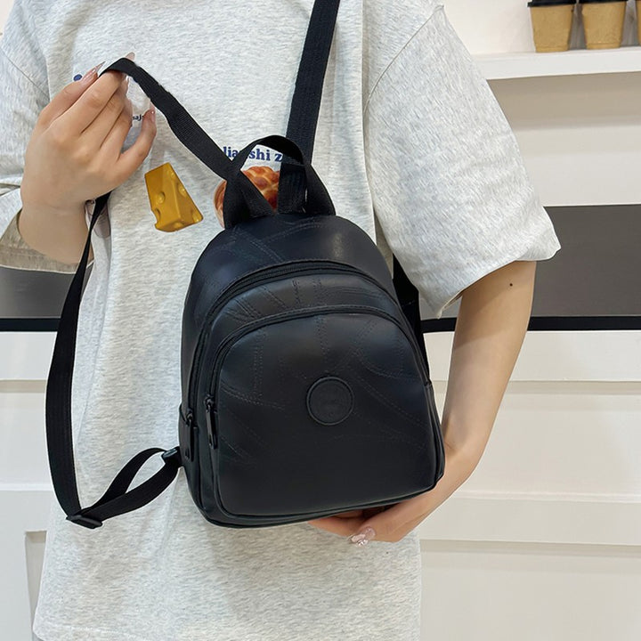 Compact Textured Backpack Bowlift