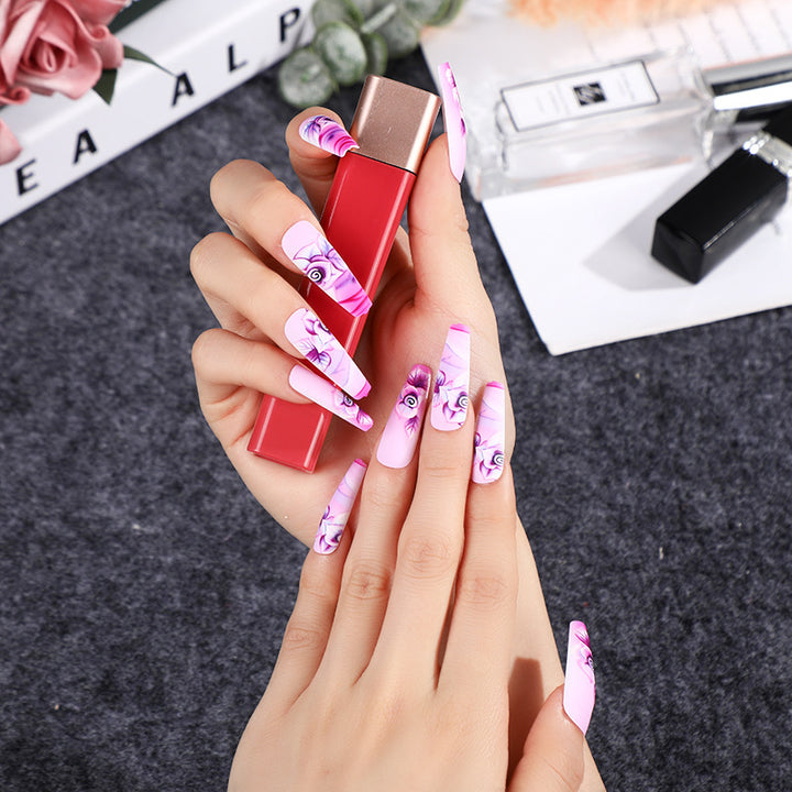 Artistic Nail Tips with Floral Design Bowlift