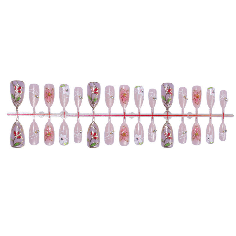 Nail art set with filigree floral decorations and shiny details Bowlift