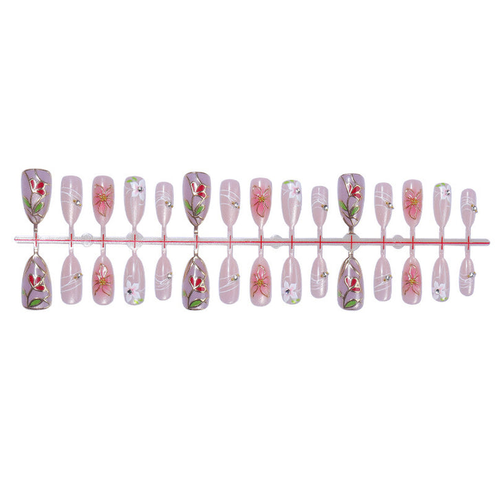 Nail art set with filigree floral decorations and shiny details Bowlift