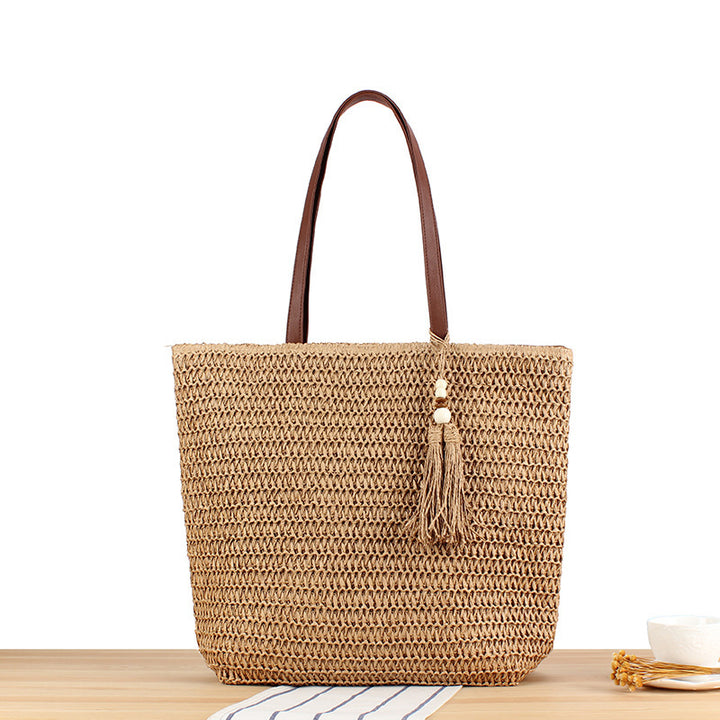 Handbag Made of Braided Natural Material with Tassel Decoration Bowlift