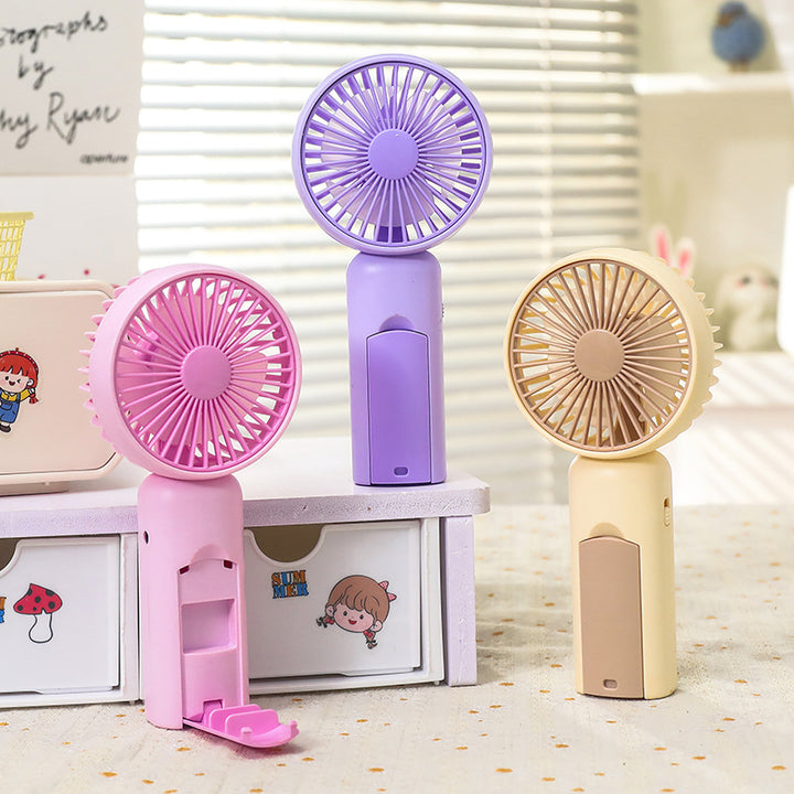 Women portable mini hand fan with USB charging function and ergonomic design Bowlift