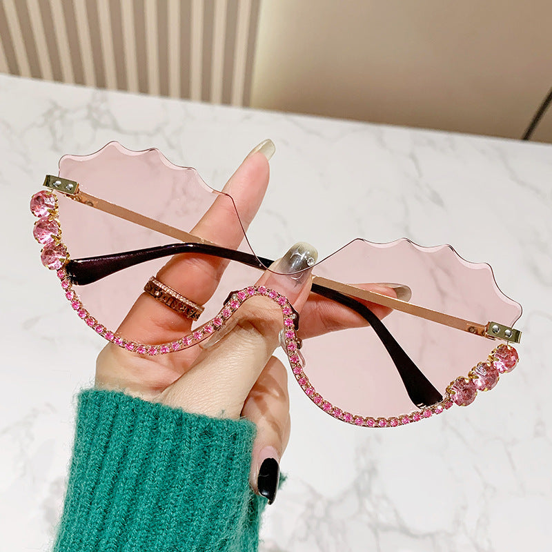 Women's extravagant sunglasses with sparkling accent and unique design Bowlift
