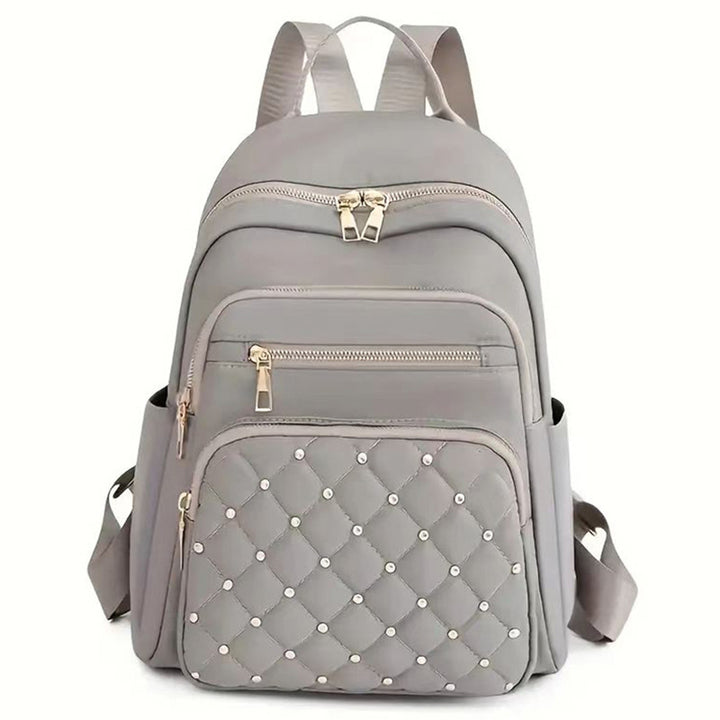 Women's Quilted Backpack with Decorative Studs Bowlift