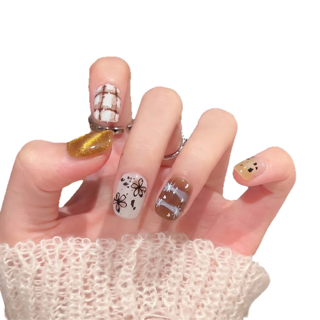 Artistic Press-On Nail Set with Unique Design Elements Bowlift
