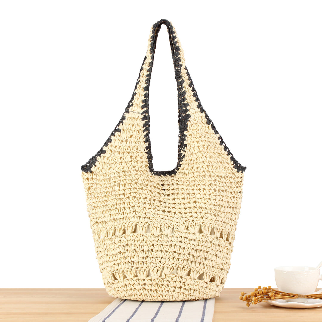 Beach shoulder bag made of handwoven natural material with comfortable carrying handles Bowlift