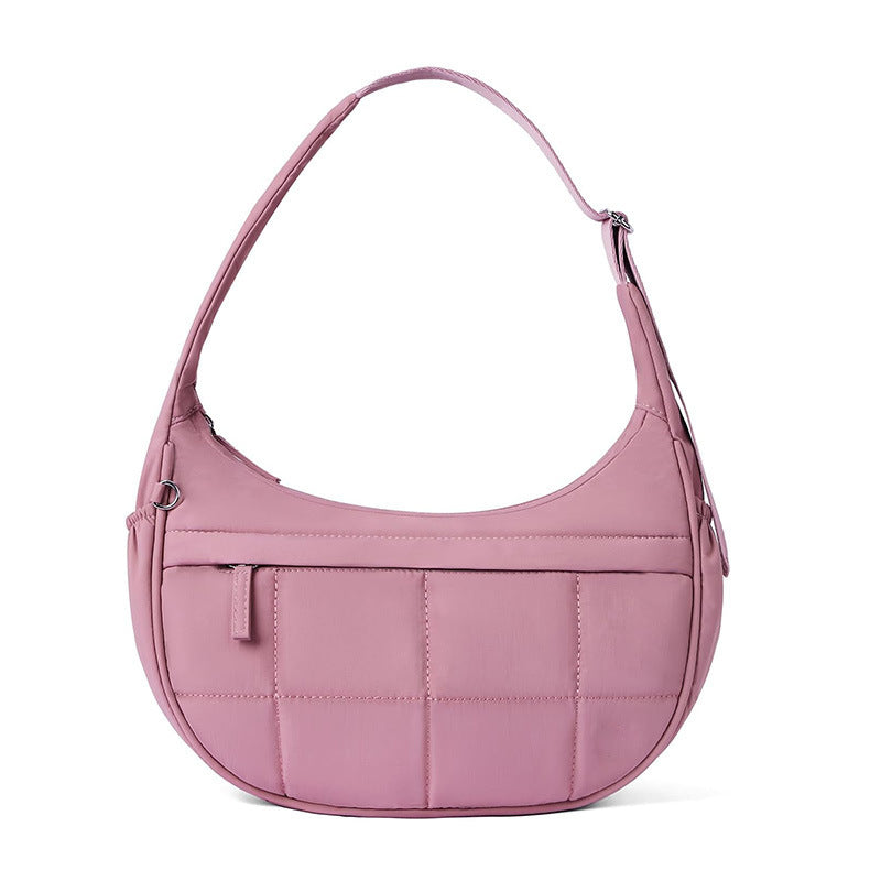 Fashionable shoulder bag with quilted surface Bowlift