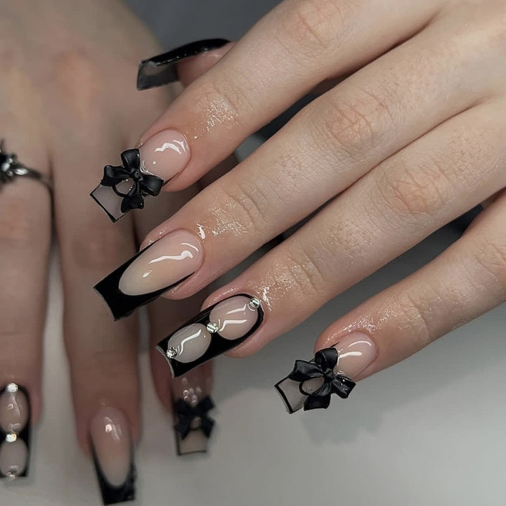Elegant Stiletto Nail Art Extensions with Bow Accents Bowlift