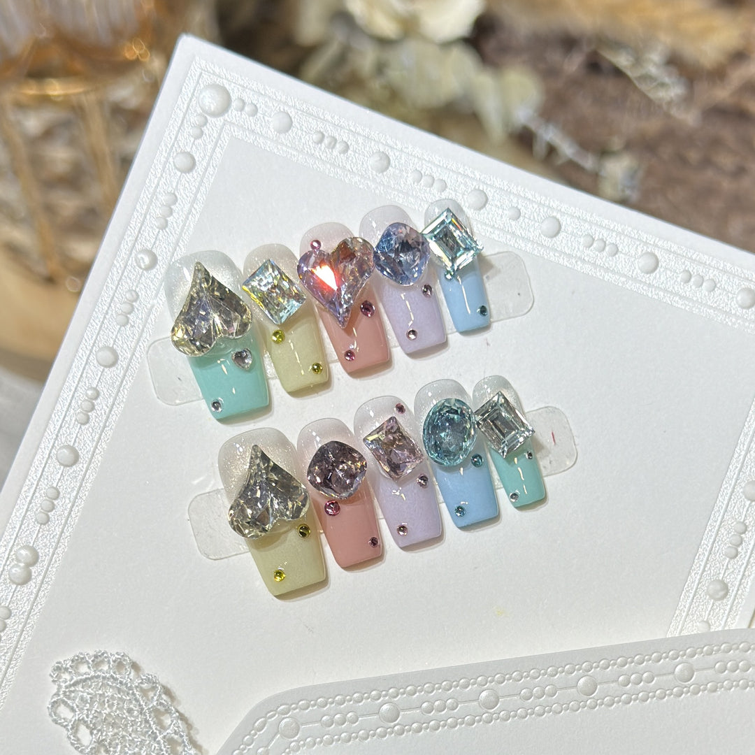 Artistic Press-On Nail Set with Gemstone Embellishments Bowlift