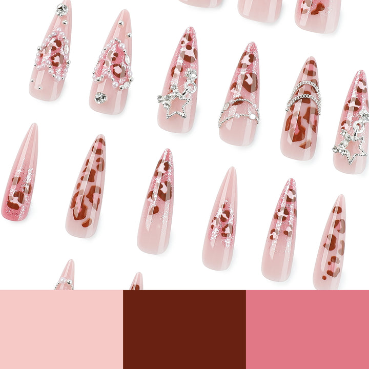Artistic stiletto nails with glitter and jewelry accents Bowlift