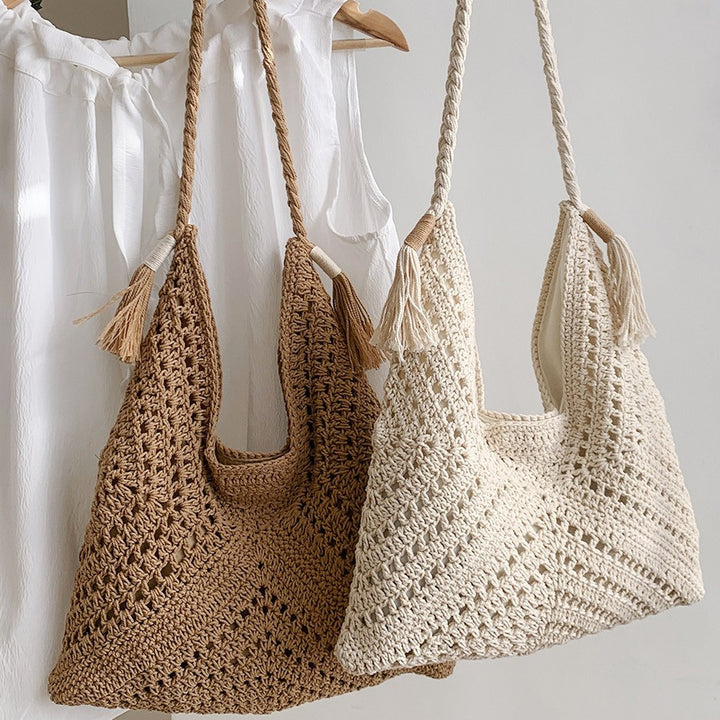 Hand-knotted shoulder bag with tassels and spacious interior Bowlift
