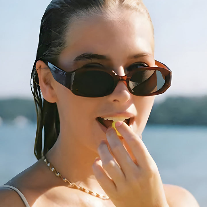 Women extravagant sunglasses in stylish retro design Bowlift