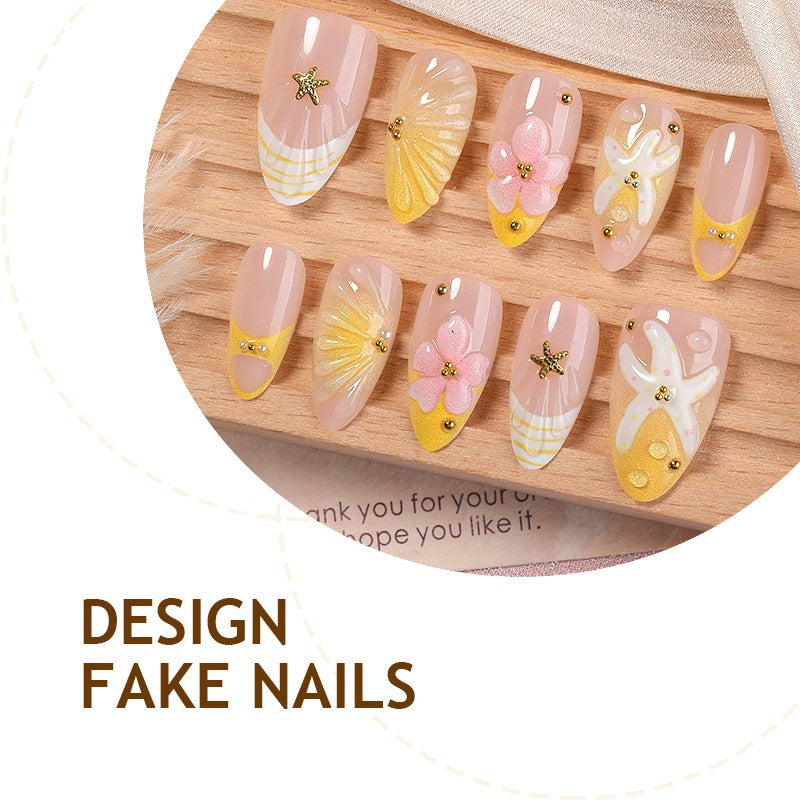 Nail art set with handmade floral accents and glitter details Bowlift