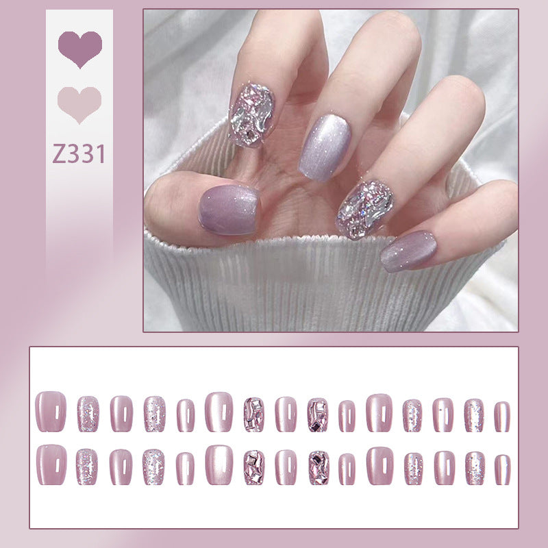 Artificial nail set with glitter and metallic effects Bowlift