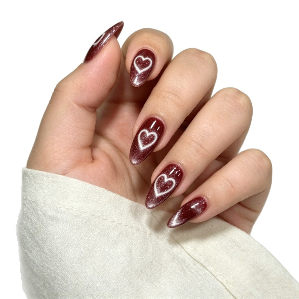 Artificial nails with luxurious heart design and shimmering finish Bowlift