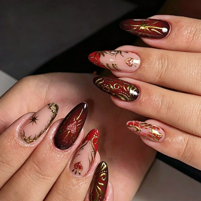 Decorative Press-On Nail Art Set with Intricate Gold Floral Design Bowlift