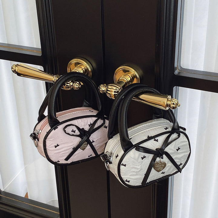 Quilted Mini Handbag with Heart Detail Bowlift