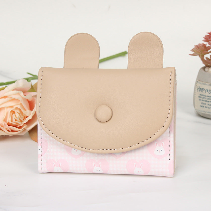 Compact rabbit-themed coin purse with snap closure and card slots Bowlift