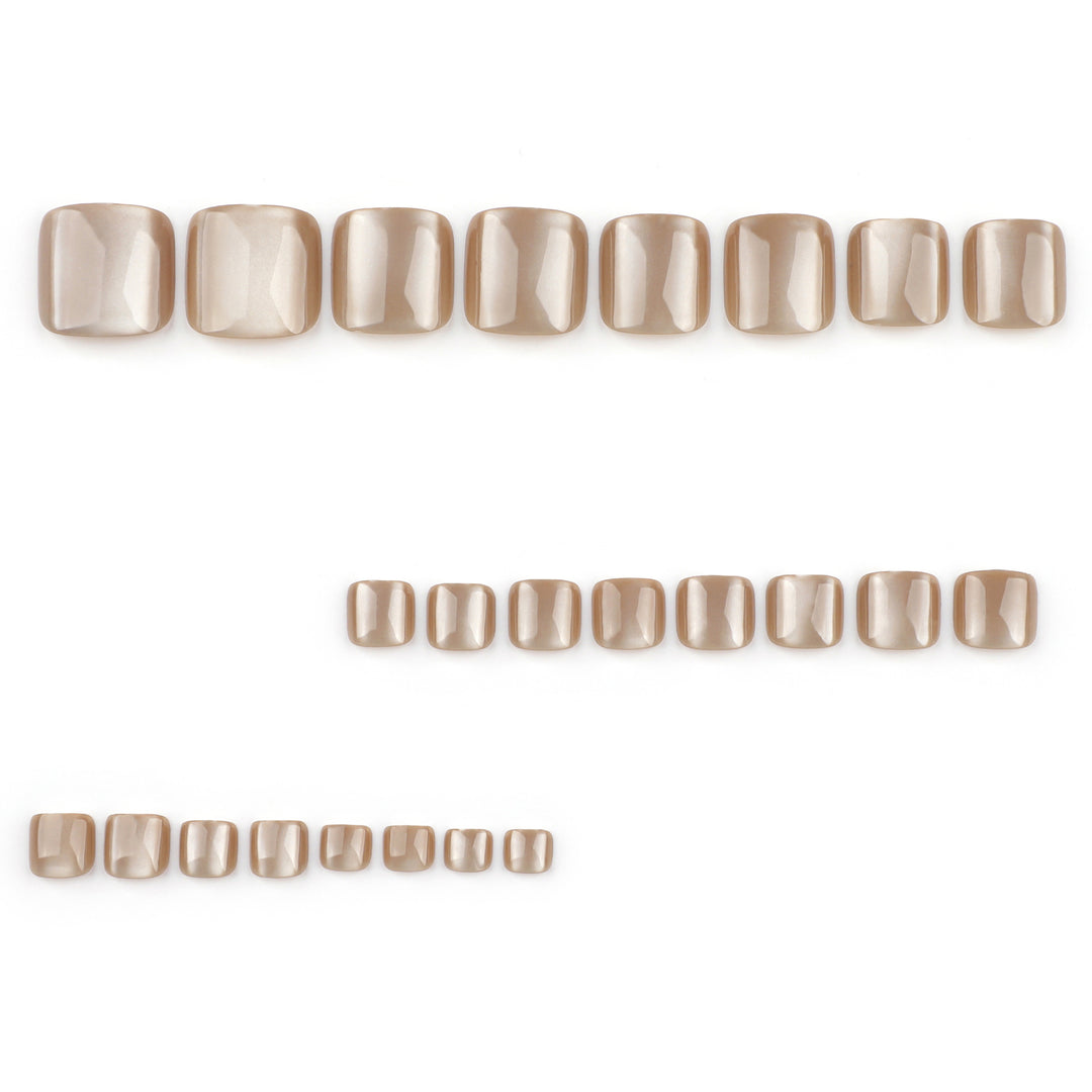 Artful nail art with glitter accents and soft ombre effect Bowlift