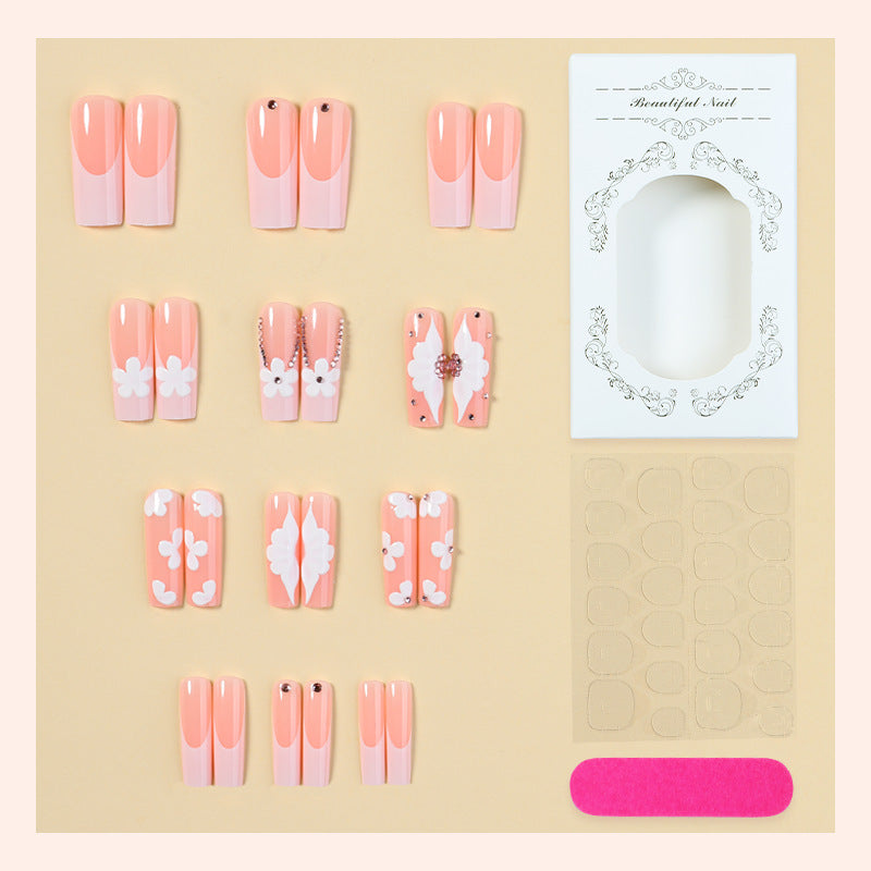 Artificial nail set with delicate flower and glitter details Bowlift