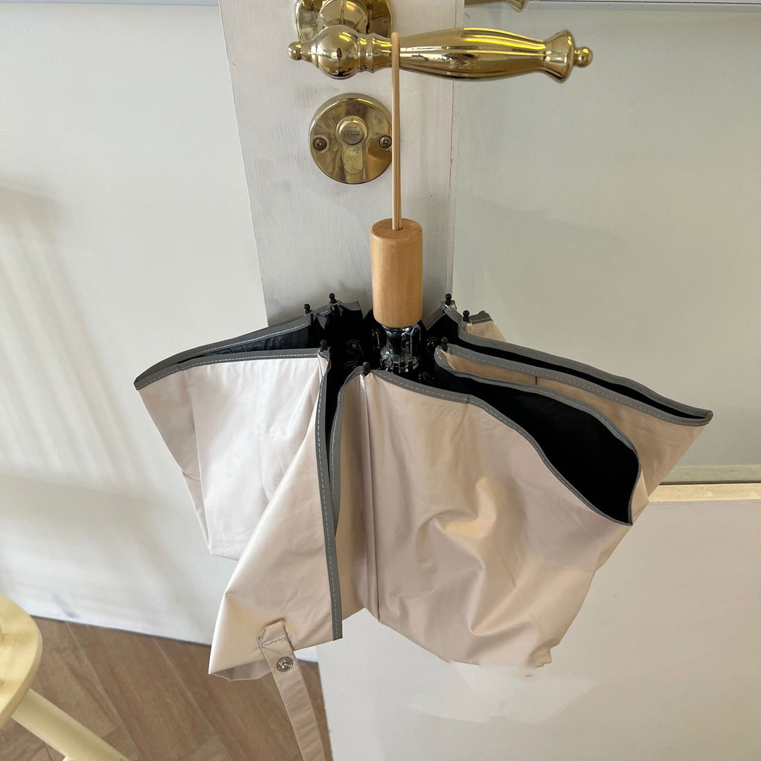 Women's automatic folding umbrella with elegant design and ergonomic wooden handle Bowlift