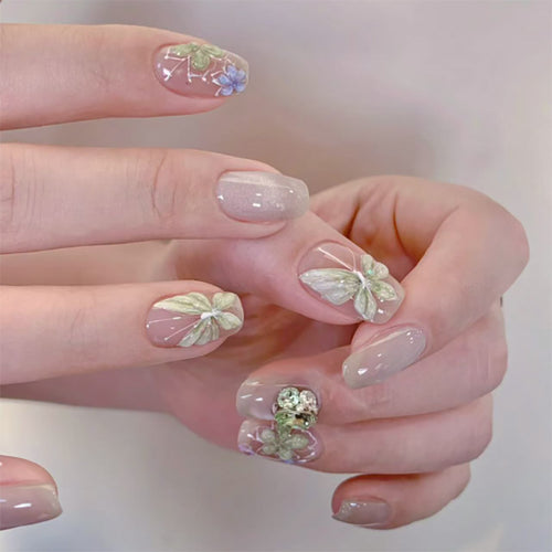 Elegant Nail Art with Floral Accents Bowlift