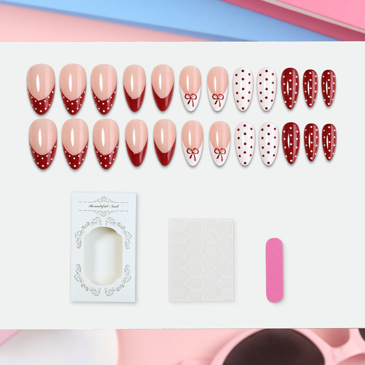 Nail set with elegant bows and polka dots Bowlift