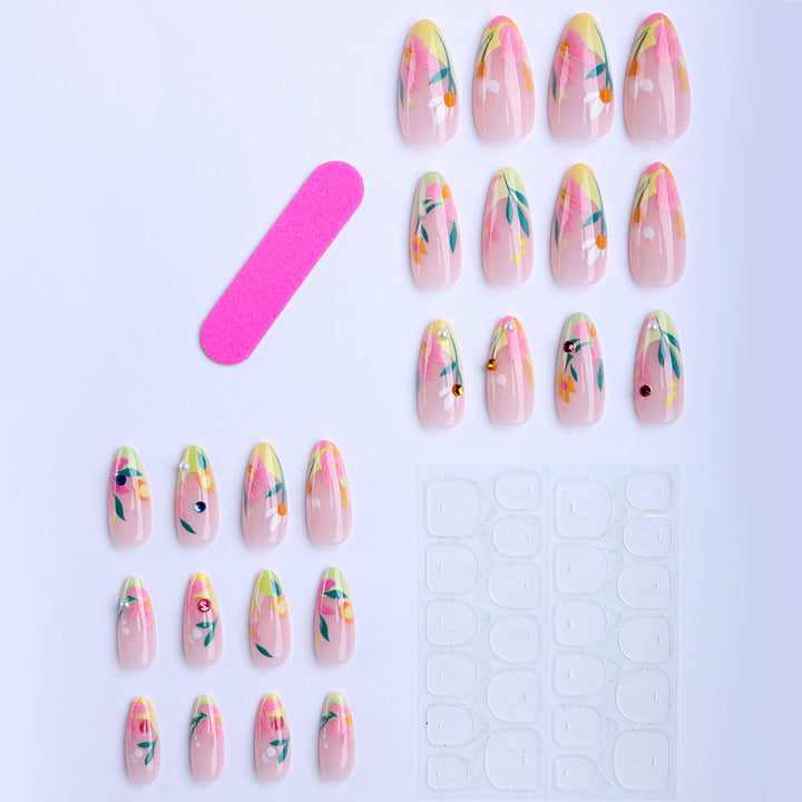 Artificial nails with flower design and glitter accents Bowlift