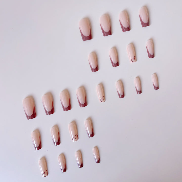 Glamorous artificial nails with elegant tips and heart design Bowlift