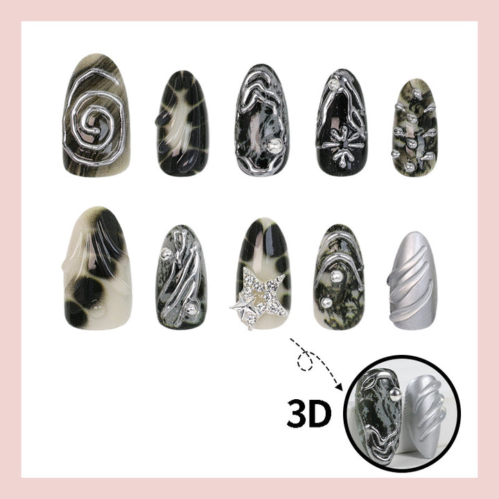Art nail set with artistic patterns and glitter accents Bowlift