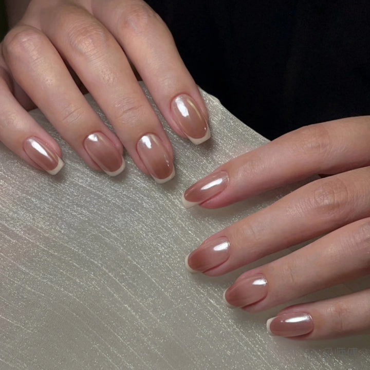Artistic manicure with elegant French tip Bowlift