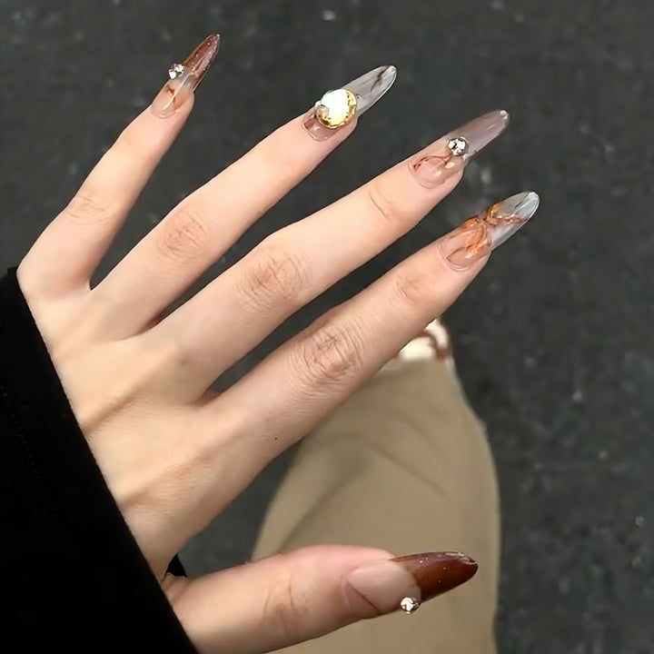 Artificial nails with elegant 3D details and sparkling accents Bowlift