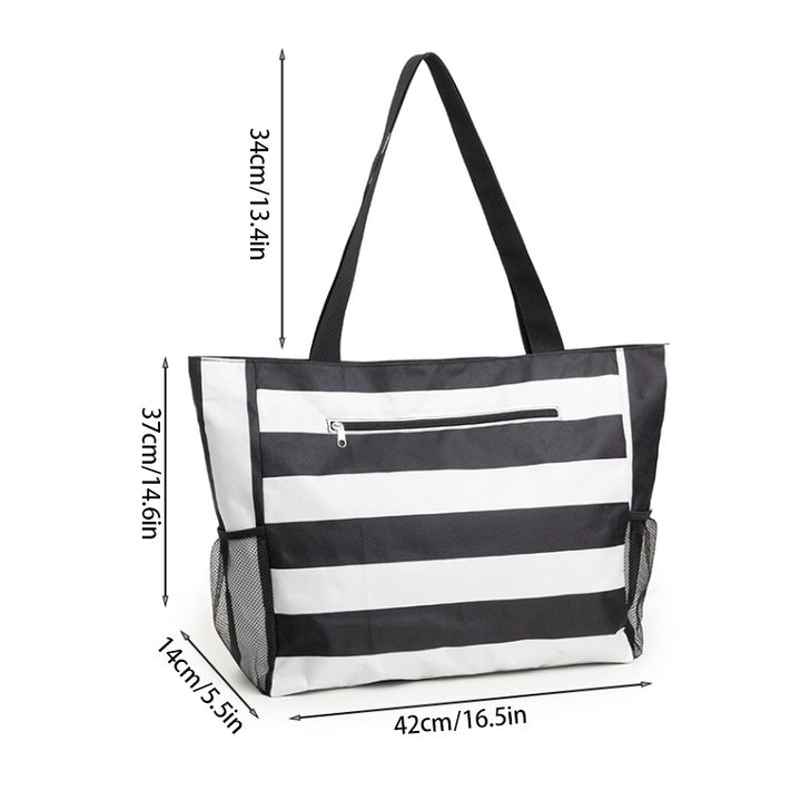 Practical beach bag with multiple compartments Bowlift